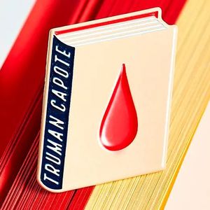 PIN ESMALTADO TRUMAN CAPOTE